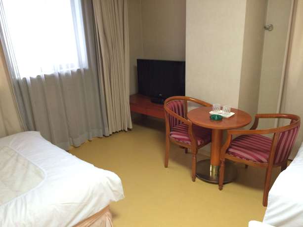 Imagen de la habitación del Hotel Busan Central. Foto 11