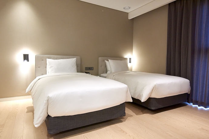 Imagen de la habitación del Hotel Busan City. Foto 15