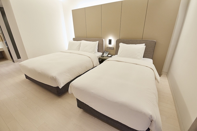 Imagen de la habitación del Hotel Busan City. Foto 16