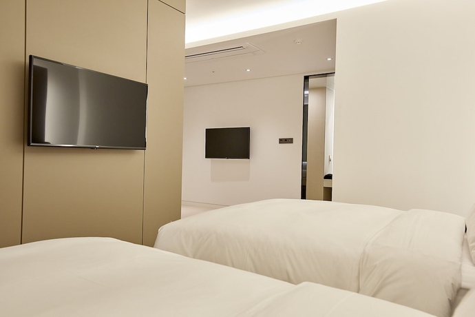Imagen de la habitación del Hotel Busan City. Foto 18