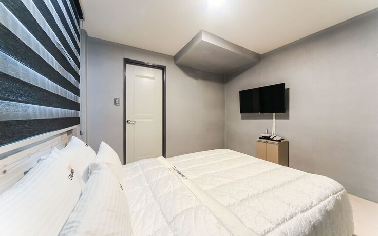 Imagen de la habitación del Hotel Busan Dadaepo Coza 837. Foto 28