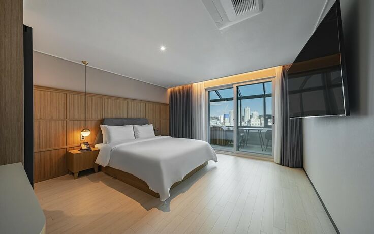 Imagen de la habitación del Hotel Busan Gijang Brown Dot. Foto 11
