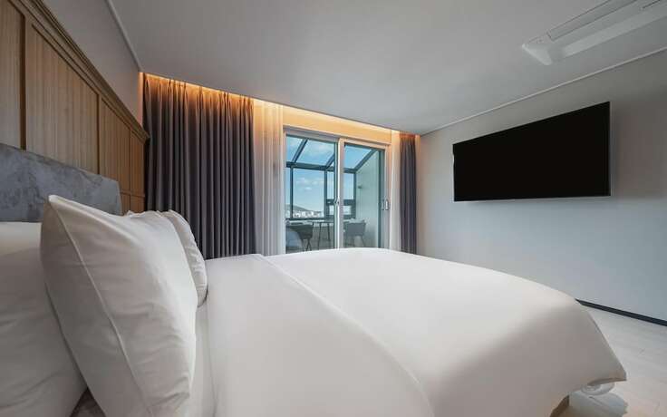 Imagen de la habitación del Hotel Busan Gijang Brown Dot. Foto 16