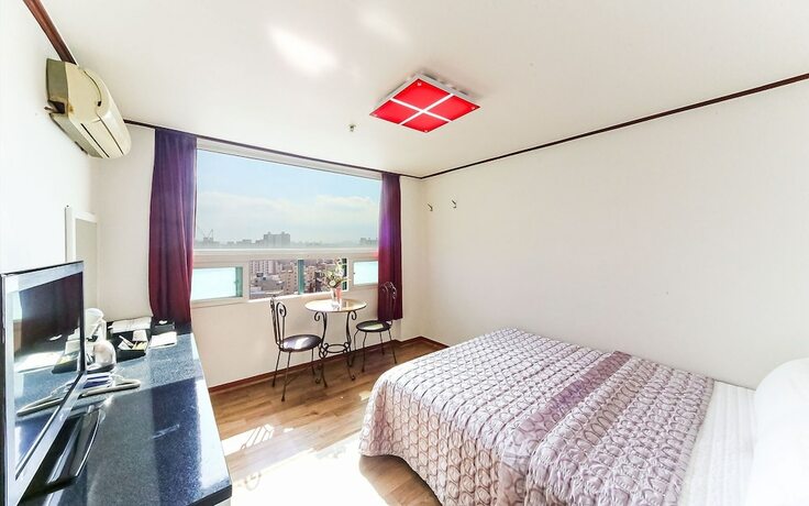 Imagen de la habitación del Hotel Busan Hadan Green Hill. Foto 24