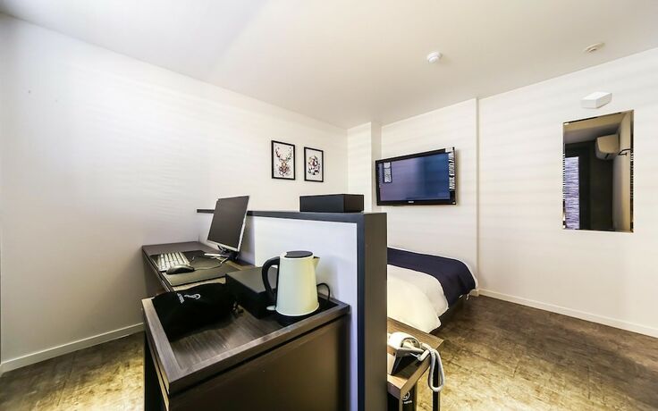 Imagen de la habitación del Hotel Busan Jaesong-dong Lrui. Foto 18