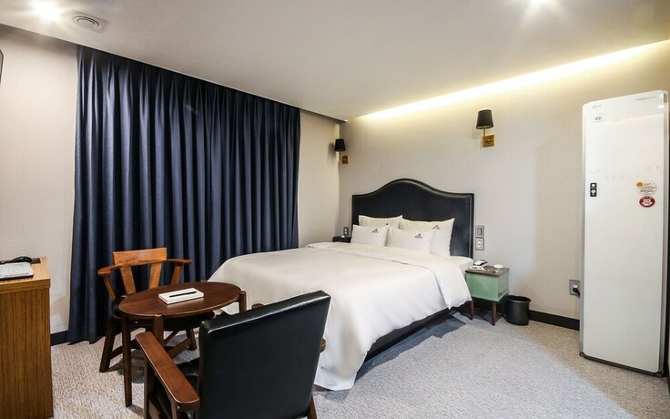 Imagen de la habitación del Hotel Busan Oncheonjang Mithuna. Foto 21
