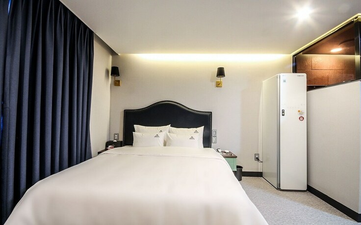 Imagen de la habitación del Hotel Busan Oncheonjang Mithuna. Foto 25
