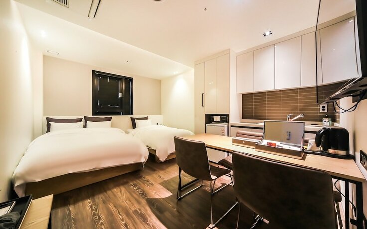 Imagen de la habitación del Hotel Busan Songjung Yeowoobi. Foto 30
