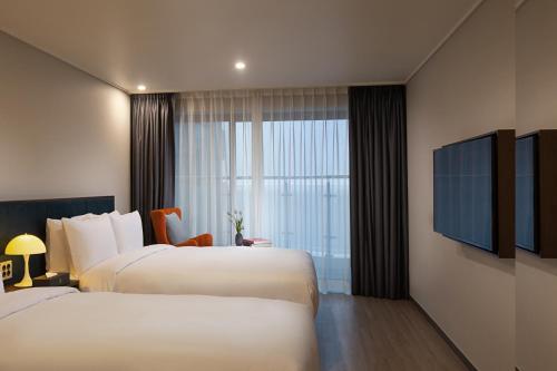 Imagen de la habitación del Hotel Busan Yeongmu Parade Hotel Haeundae Beach. Foto 3