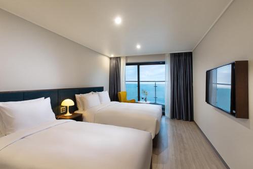Imagen de la habitación del Hotel Busan Yeongmu Parade Hotel Haeundae Beach. Foto 5