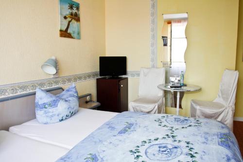 Imagen de la habitación del Hotel Busch in Wilster. Foto 4