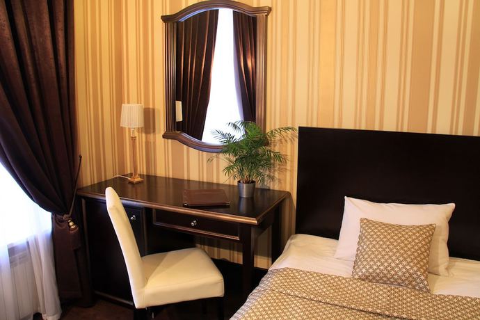 Imagen de la habitación del Hotel Business Apartments. Foto 9