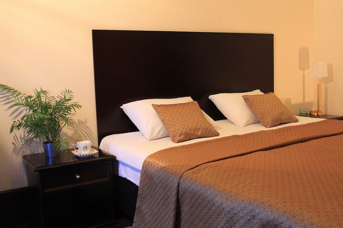 Imagen de la habitación del Hotel Business Apartments. Foto 12