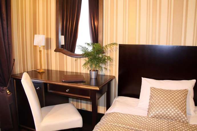 Imagen de la habitación del Hotel Business Apartments. Foto 17