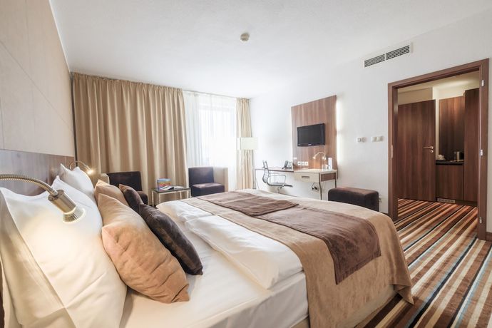 Imagen de la habitación del Hotel Business Astrum Laus. Foto 14