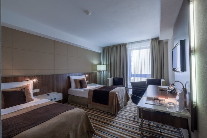 Imagen de la habitación del Hotel Business Astrum Laus. Foto 15