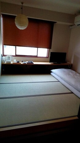Imagen de la habitación del Hotel Business Atelier. Foto 21