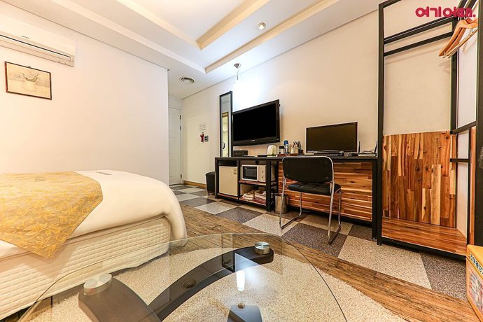 Imagen de la habitación del Hotel Business, Cheonan. Foto 13