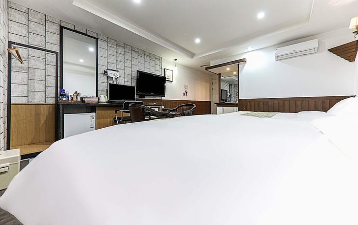 Imagen de la habitación del Hotel Business, Cheonan. Foto 16