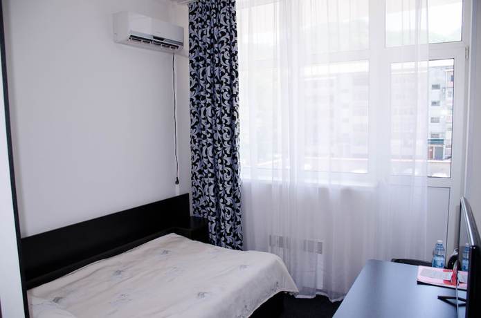 Imagen de la habitación del Hotel Business, Dalnegorsk. Foto 5