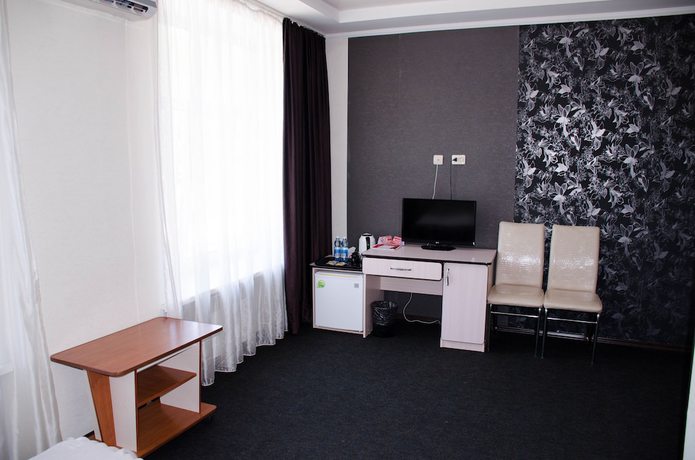 Imagen de la habitación del Hotel Business, Dalnegorsk. Foto 10