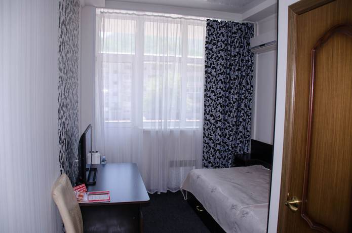 Imagen de la habitación del Hotel Business, Dalnegorsk. Foto 12