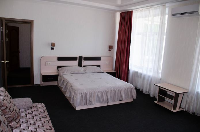 Imagen de la habitación del Hotel Business, Dalnegorsk. Foto 14