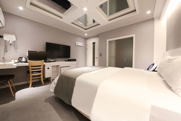 Imagen de la habitación del Hotel Business Duu. Foto 8