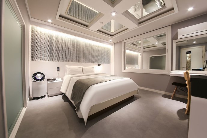 Imagen de la habitación del Hotel Business Duu. Foto 10