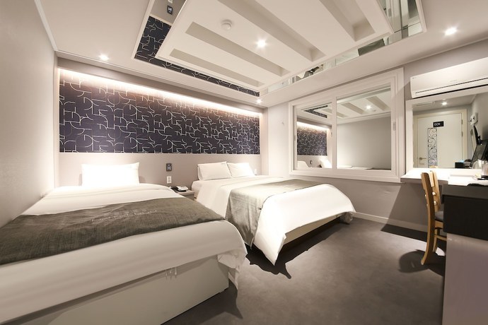 Imagen de la habitación del Hotel Business Duu. Foto 12