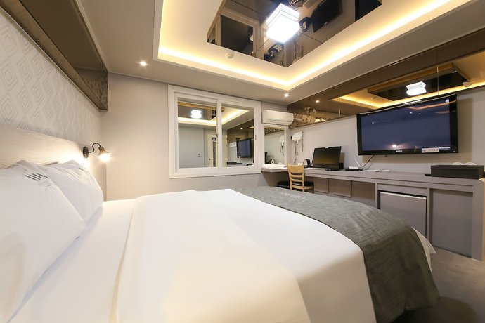 Imagen de la habitación del Hotel Business Duu. Foto 13