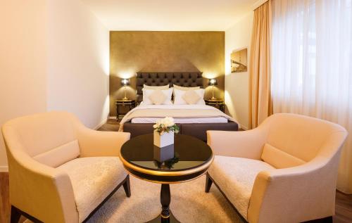 Imagen de la habitación del Hotel Business First. Foto 6