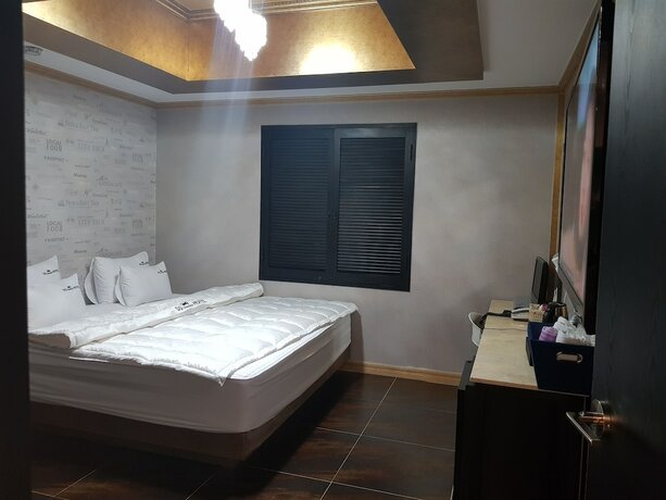 Imagen de la habitación del Hotel Business, Gangseo-Gu. Foto 14