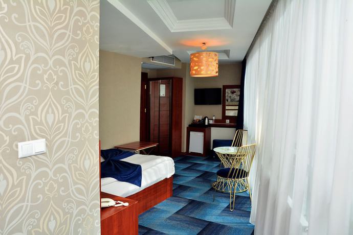 Imagen de la habitación del Hotel Business Grand. Foto 2