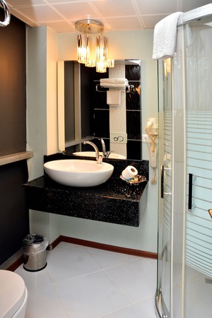 Imagen de la habitación del Hotel Business Grand. Foto 4