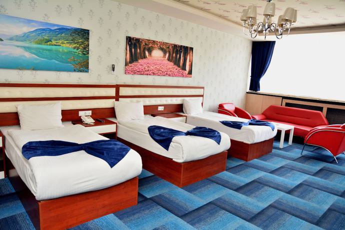 Imagen de la habitación del Hotel Business Grand. Foto 11