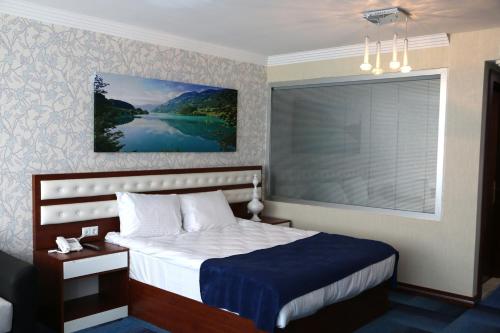 Imagen de la habitación del Hotel Business Grand Hotel. Foto 6