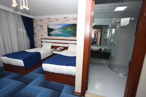 Imagen de la habitación del Hotel Business Grand Hotel. Foto 7