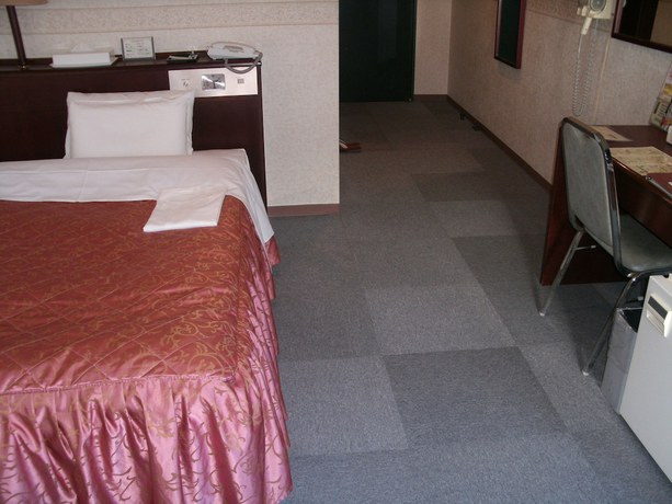 Imagen de la habitación del Hotel Business Honjo. Foto 11