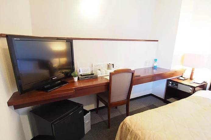 Imagen de la habitación del Hotel Business Honjo. Foto 13