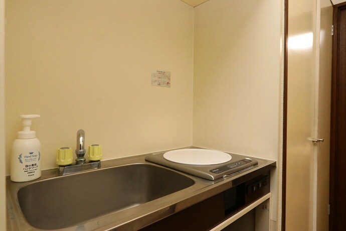 Imagen de la habitación del Hotel Business Inn Grandeur Fuchu. Foto 3