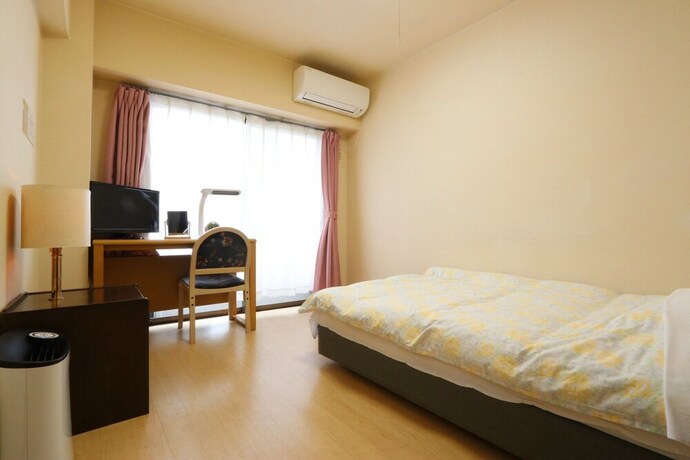 Imagen de la habitación del Hotel Business Inn Grandeur Fuchu. Foto 4