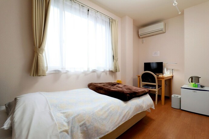 Imagen de la habitación del Hotel Business Inn Grandeur Fuchu. Foto 5