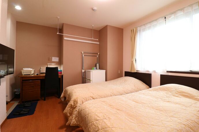 Imagen de la habitación del Hotel Business Inn Grandeur Fuchu. Foto 13