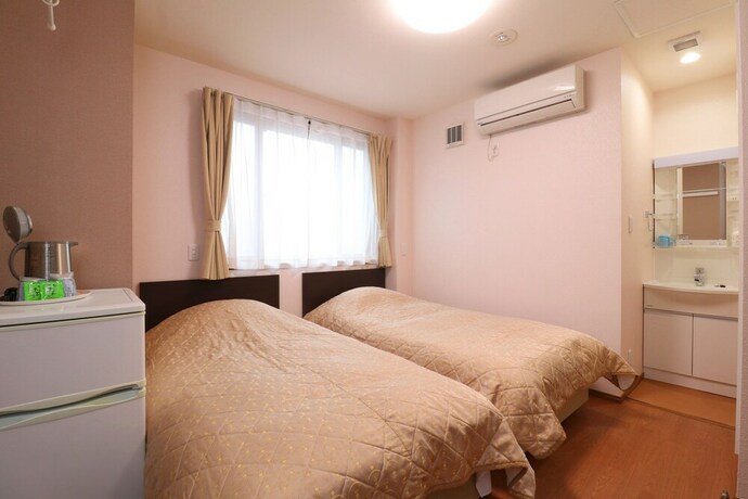 Imagen de la habitación del Hotel Business Inn Grandeur Fuchu. Foto 16