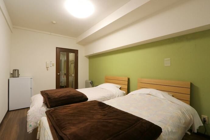 Imagen de la habitación del Hotel Business Inn Grandeur Fuchu. Foto 18