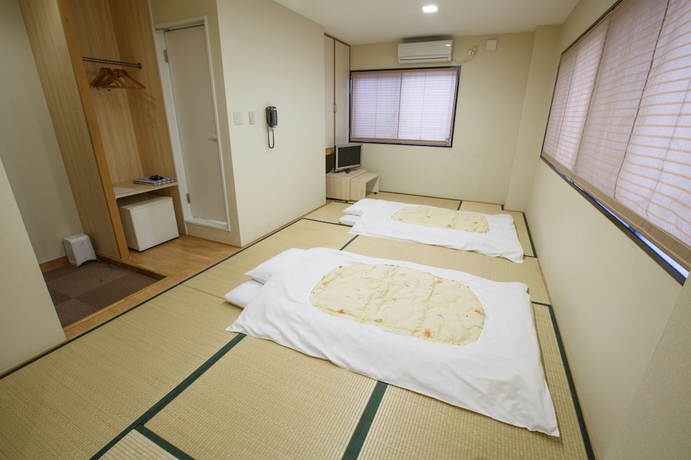 Imagen de la habitación del Hotel Business Inn Umesaki. Foto 10
