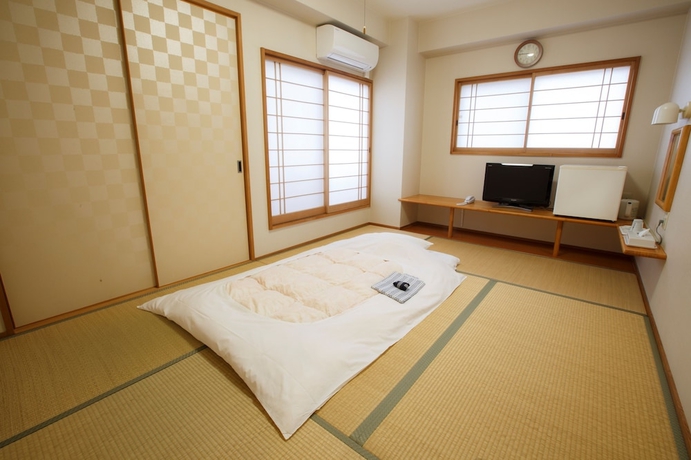 Imagen de la habitación del Hotel Business Inn Umesaki. Foto 11
