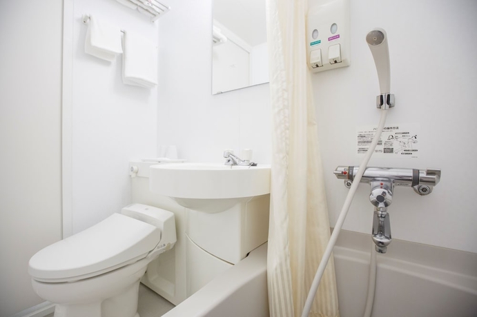 Imagen de la habitación del Hotel Business Inn Umesaki. Foto 12