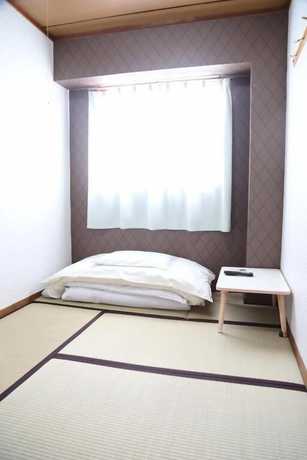 Imagen de la habitación del Hotel Business Kaga. Foto 5